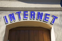 Internet sign above door to Internet cafe.