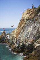 Cliff diver  a clavadista  diving off the cliffs at La Quebrada