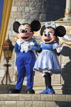 Walt Disney World Resort. Mickey and Minnie Mouse characters on stage in the Magic Kingdom.TravelTourismHolidayVacationExploreRecreationLeisureSightseeingTouristAttractionTourDestinationT...
