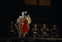 A young boy actor or koyaku in the role of the child emperor Antoku in a kabuki play about the twelfth century Gempei war.  Child actors are normally the real or adopted sons of established company pl...