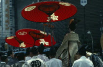 Gion Festival.  Four days before the festival climax the  chigo  the pageboy of the god to whom the festival is dedicated  dressed in the silk robes of a Heian nobleman is taken on a white horse to a...
