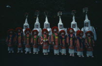Gion Festival.  Children dressed for Shinto dances pose for photographer at the Yasaka Shrine.