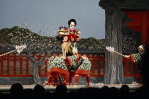 The actor Ennosuke playing the role of the fox Tadanobu in the kabuki story  Yoshitsune Senbon Zakura.   In this scene a fox disguises itself as a retainer of Yoritomo  the brother of Yoshitsune  in o...