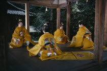 Sagimori Shrine.  Bugaku has been preserved for over a thousand years by courtiers of the Imperial Palace  normally performed exclusively by men  these girls dressed in traditional yellow costume  are...