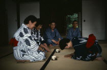 The samurai class no longer exists  but there are still samurai families who remain proud of their ancestry and who continue to live in traditional samurai houses.  Women dressed in kimonos kneel on f...