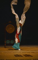 Buddhist drum dance adapted for National Theatre performance.  Also found in kisaeng houses  which resemble the geisha houses of Japan.  Highly developed art form of fluid movement and never static.