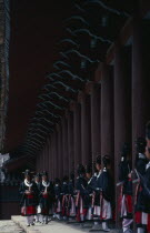 Confucian rites at Chongmyo Shrine.  Confucianism teaches reverence for the past and submissiveness to authority.  Such rites are now only still enacted in Korea.