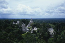 Aerial view over the ruins and surrounding tree tops