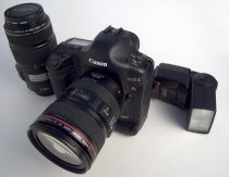 Canon 1DS MkII 17 mega pixel digital SLR camera with image stabilising lenses and Speedlite electronic flash.