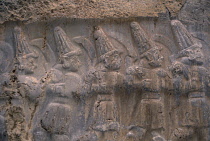 Hattusas.  Ancient site of Hittite capital.  Stone relief carving in the Great Temple dedicated to the storm god Teshub and the sun goddess Hebut.