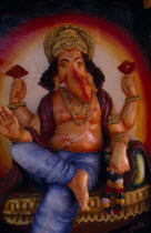Painted temple statue of elephant headed god Ganesh.