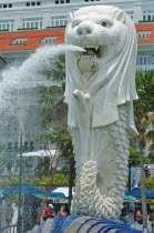 SITUATED INFRONT OF THE FULLERTON HOTEL AND FINACIAL DISTRICT BEHIND. The Merlion is one of the most well-known tourist icons of Singapore. Its landmark statue  once at the Merlion Park  was relocated...