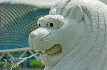 SITUATED INFRONT OF THE FULLERTON HOTEL AND FINACIAL DISTRICT BEHIND.The Merlion is one of the most well-known tourist icons of Singapore. Its landmark statue  once at the Merlion Park  was relocated...