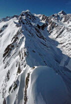 MOUNT COOK NATIONAL PARK  AERIAL VIEW OF MOUNTAIN RIDGE LEADING TO THE WEST FACE OF MOUNT TASMAN AND MOUNT COOK  TOP RIGHT .Antipodean Oceania Scenic