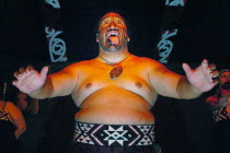 ROTORUA  THE HARKA WAR DANCE PERFORMED BY MAORI AT THE TAMAKI MAORI VILLAGE PERFORMED IN THE WHENUAI OR BIG HOUSE 15 MILE SOUTH OF ROTORUA.Antipodean Oceania One individual Solo Lone Solitary Perform...