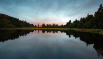 LAKE MATHESON  DUSK LOOKING EAST ACROSS LAKE MATHESON TOWARDS FOX GLACIER.Antipodean Oceania