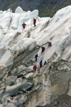 MOUNT COOK NATIONAL PARK  A GROUP HIKES THE FRANZ JOSEF GLACIER. Julius von Haast  geologist and explorer  named Franz Josef Glacier in 1863  after the Emperor of the Austro-Hungarian Empire. Approxim...