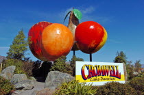 OTAGO  CROMWELL TOWN SIGN WHICH CONSISTS OF GIANT FIBRE GLASS PEACH  PEAR  APPLE AND ORANGE.Antipodean Oceania Fiber