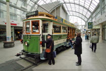 CANTERBURY  CITY TOUR TRAMS AT A TRAM STOP IN WORCESTER STREet.Antipodean Oceania