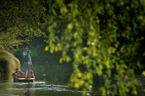 CANTERBURY  TOURISTS BEING PUNTED ALONG THE RIVER AVON IN CHRISTCHURCH.Antipodean Oceania