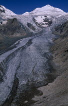 Pasterze Glacier in mountain range forming part of the Eastern Alps.  Ice slope and snow covering peaks.