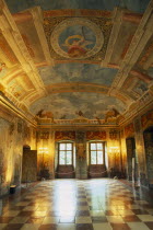 Hellbrunn Palace  dating from early 17th c.  Interior of banqueting hall with  trompe l oeil painting covering walls and ceiling and chequered floor.