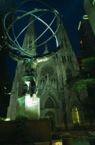 Atlas and St Patricks Cathedral illuminated at night
