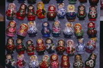 Colourful painted matryoshka dolls for sale in souvenir shop.