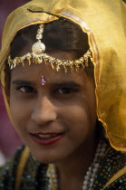 Head and shoulders portrait of a young girl at the Alwar Utsav Festival