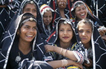 Group of young dancers smiling and laughing at the Alwar Utsav Festival
