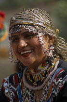 Portrait of a Kalbelia dancer women smiling at the Alwar Utsav Festival