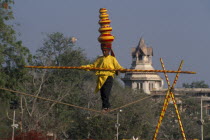 Young boy balancing on the high wire at the Jaipur Heritage Festival