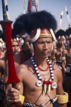 Portrait of a male tribal dancer from Nagaland at the Jaipur Heritage Festival