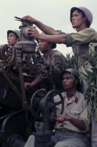 North Vietnamese soldiers with anti aircraft missile launcher.