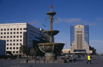 Fountain and government buildings in the capital.