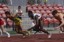 Competitors in mens track event at school championships.