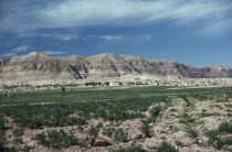 View over landscape toward the Judean Hills near Jericho with houses at the base