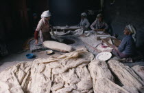 Women making bread.