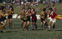 Young boys playing game of rugby. Australia. Warringham Rugby park