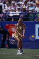 Anna Kournikova competing at Wimbledon