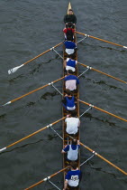 Rowing on the River Thames with view above boat and rowers