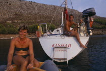 Man and woman yachting couple in Greece