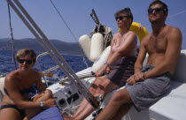 Men and women sailing in Greece