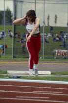 Female shot-putter competing