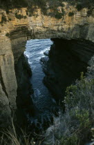 Near Eaglehawk Neck on the Tasman Peninsula.  Coastal rock formation forming natural arch.