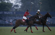 Prince Charles taking part in a polo match at Windsor