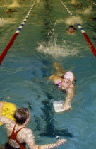 Girls in pool during club swimming practice.