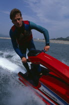 Cloes up of Jet Skier in action.