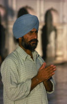 Hari Mandir or Golden Temple. Portrait of a man in prayer at the Sikh temple Asia Asian Bharat Inde Indian Intiya Male Men Guy One individual Solo Lone Solitary Religion Religion Religious Sihism Sik...
