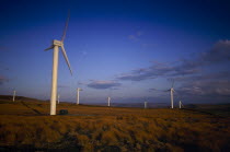 Coal Clough Windfarm with tall wind turbines leading out across the landscape  near Todmorden  West Yorkshire